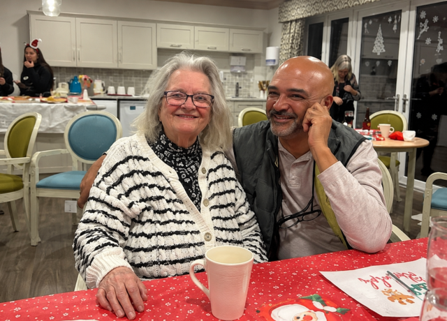 Resident Kathleen smiling after arriving and settling into Bingley Park care home